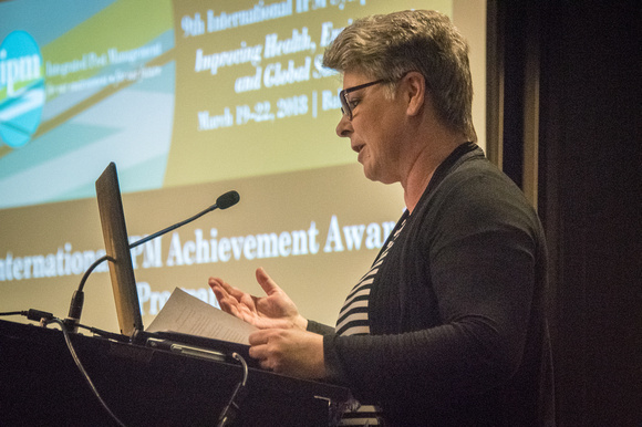 Committee member Janet Hurley speaking at podium