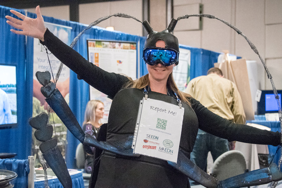 Woman posing in Asian beetle costume